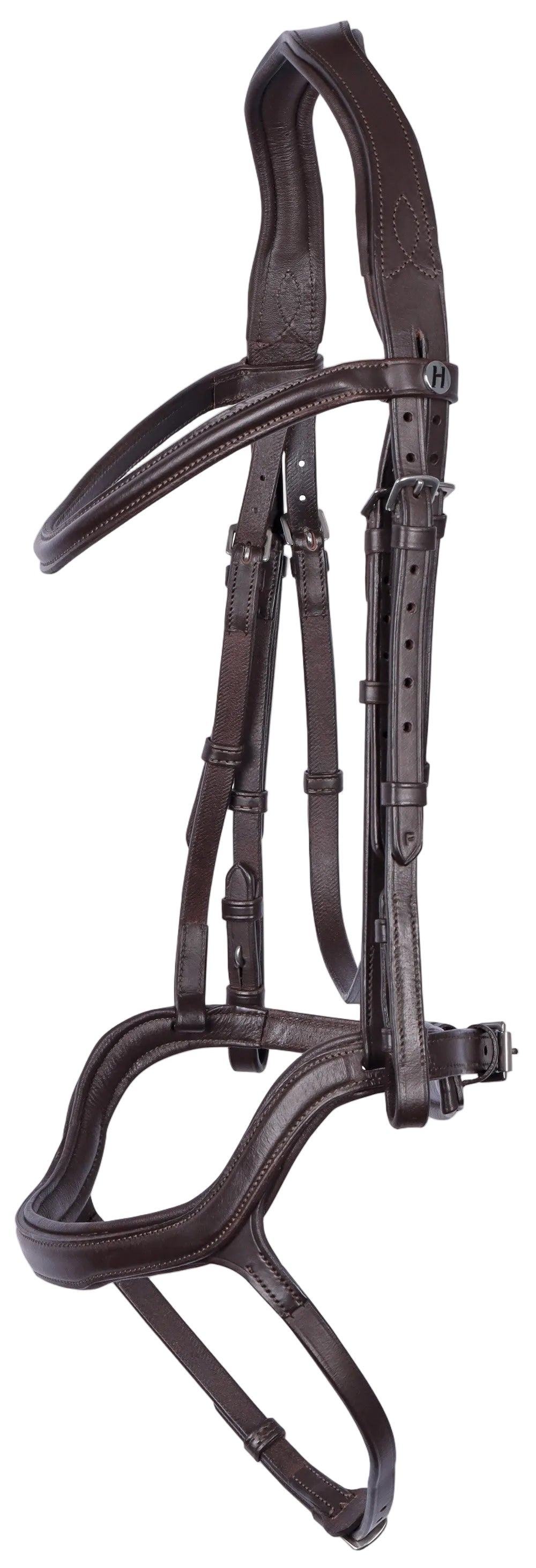 Die braune Harry’s Horse Trense Anatomic ohne Zügel hängt seitlich und zeigt die anatomische Form mit weicher Polsterung für eine pferdefreundliche und komfortable Passform bei Pferden und Ponys.