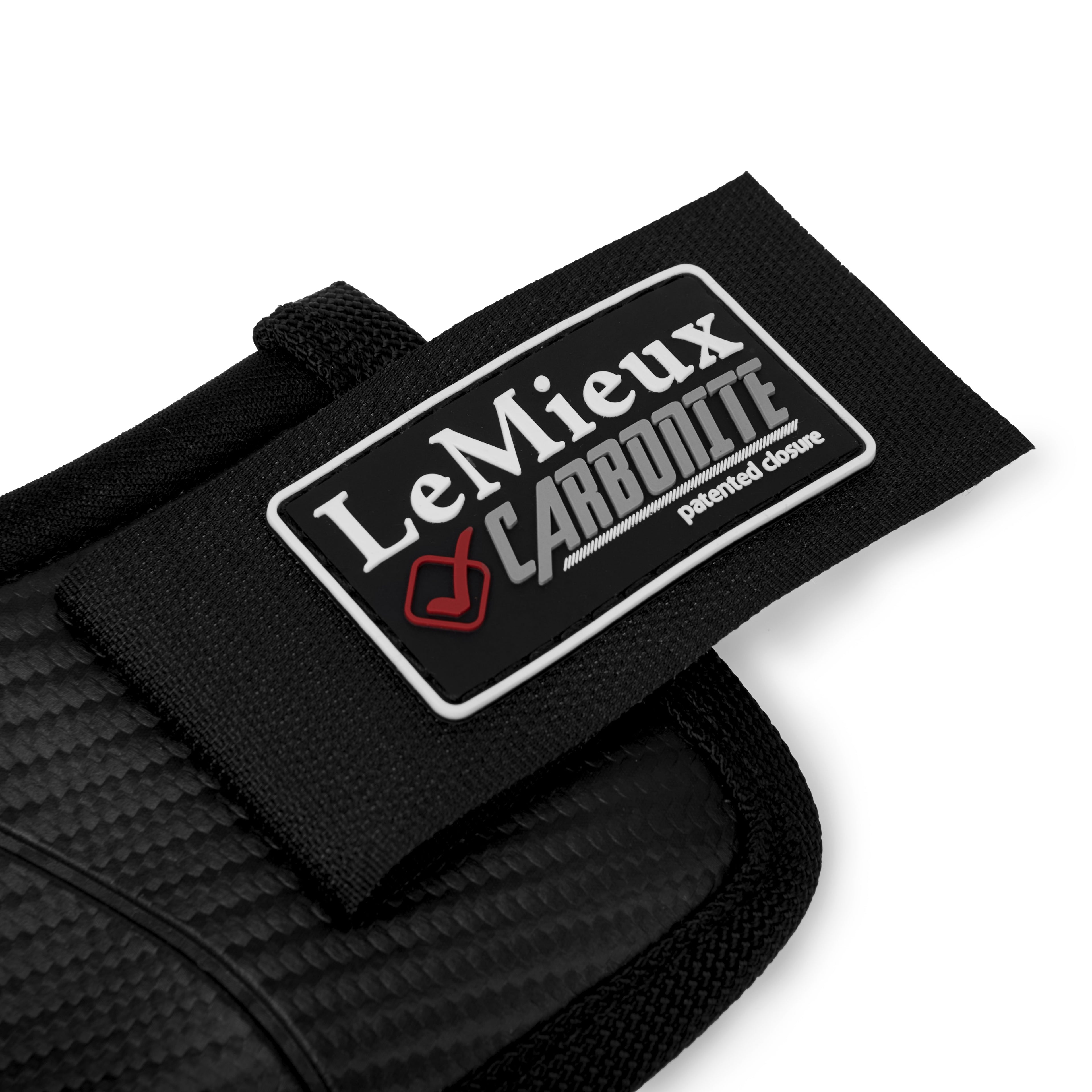 Der patentierte Klettverschluss mit LeMieux Logo der Lemieux Springglocken Carbonite in schwarz. Für festen Halt, ohne dass sich die Springglocke dreht und Schutz für Hufkronrand und Ballen deines Ponys oder Pferdes.