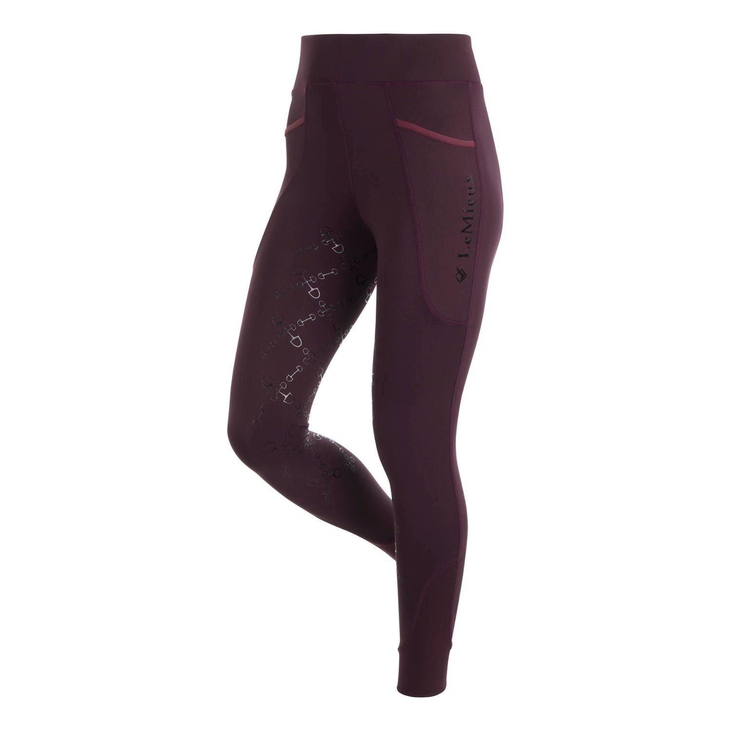 LeMieux Reitleggings fig mit hohem Bund und elastischem High Waist Design. Detailaufnahme der D-Ring Gebissmuster auf der LeMieux Reitleggings fig. Fronttaschen der LeMieux Pull On Breech Reitleggings fig mit Rosé-Details.