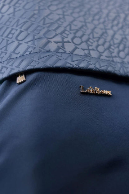 Detailaufnahme der kleinen Fronttasche der LeMieux Stiefeltasche Luxe Navy – ideal für Sporen, Lederpflege oder Zubehör. Goldener Zipper des Reißverschluss zu sehe.