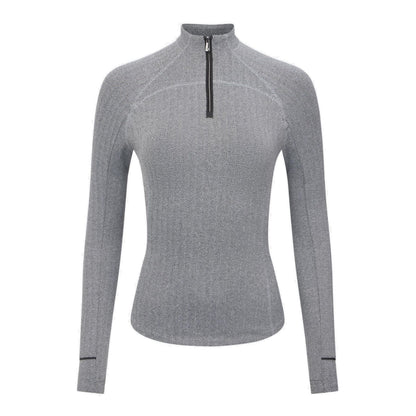 LeMieux Base Layer Aspen Herringbone Black – elegantes Reitshirt für Damen in Schwarz-Weiß mit Fischgrätmuster. Frontansicht mit kontrastfarbigen Lack-Applikation an Stehkragen und Ärmeln sichtbar.