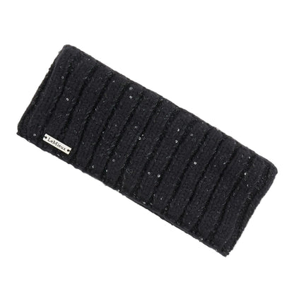 Schwarzes LeMieux-Stirnband Bernie aus Rippstrick mit dezent eingearbeitetem Paillettengarn und aufgenähtem silbernen Metall-Logo am unteren Saum. Wärmendes Damen-Strick-Headband als eleganter Ohrenschutz für Reitsport, Stall und Freizeit